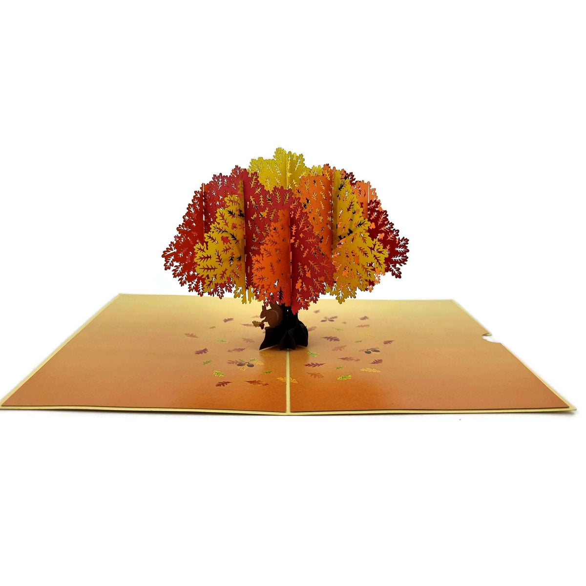 Color Pop Cards Autumn Oak Tree pop-up card with red, orange, and yellow leaves and a squirrel at the base.