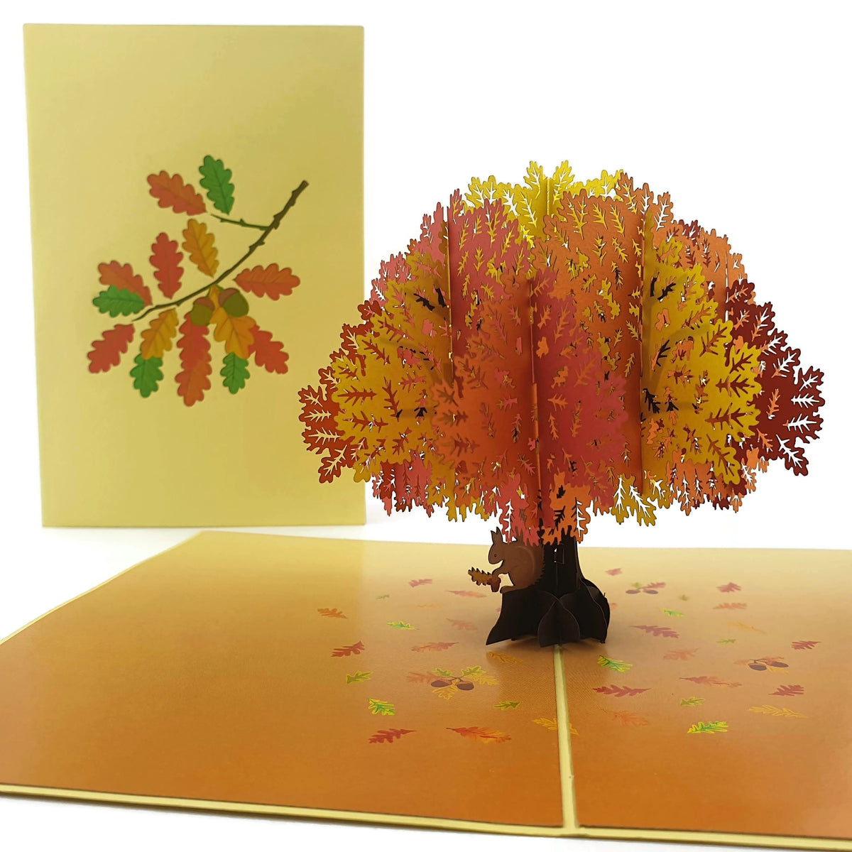Color Pop Cards Autumn Oak Tree pop-up card with orange and yellow leaves and a squirrel at the base.