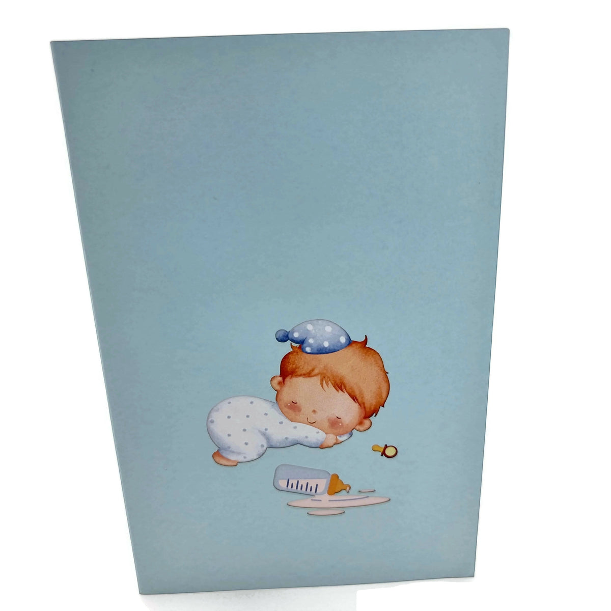 Color Pop Cards blue baby boy crib pop-up greeting card with sleeping baby illustration.
