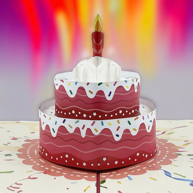 Color Pop Cards red pop-up birthday cake card with candle and sprinkles, opens to reveal a 3D cake design.