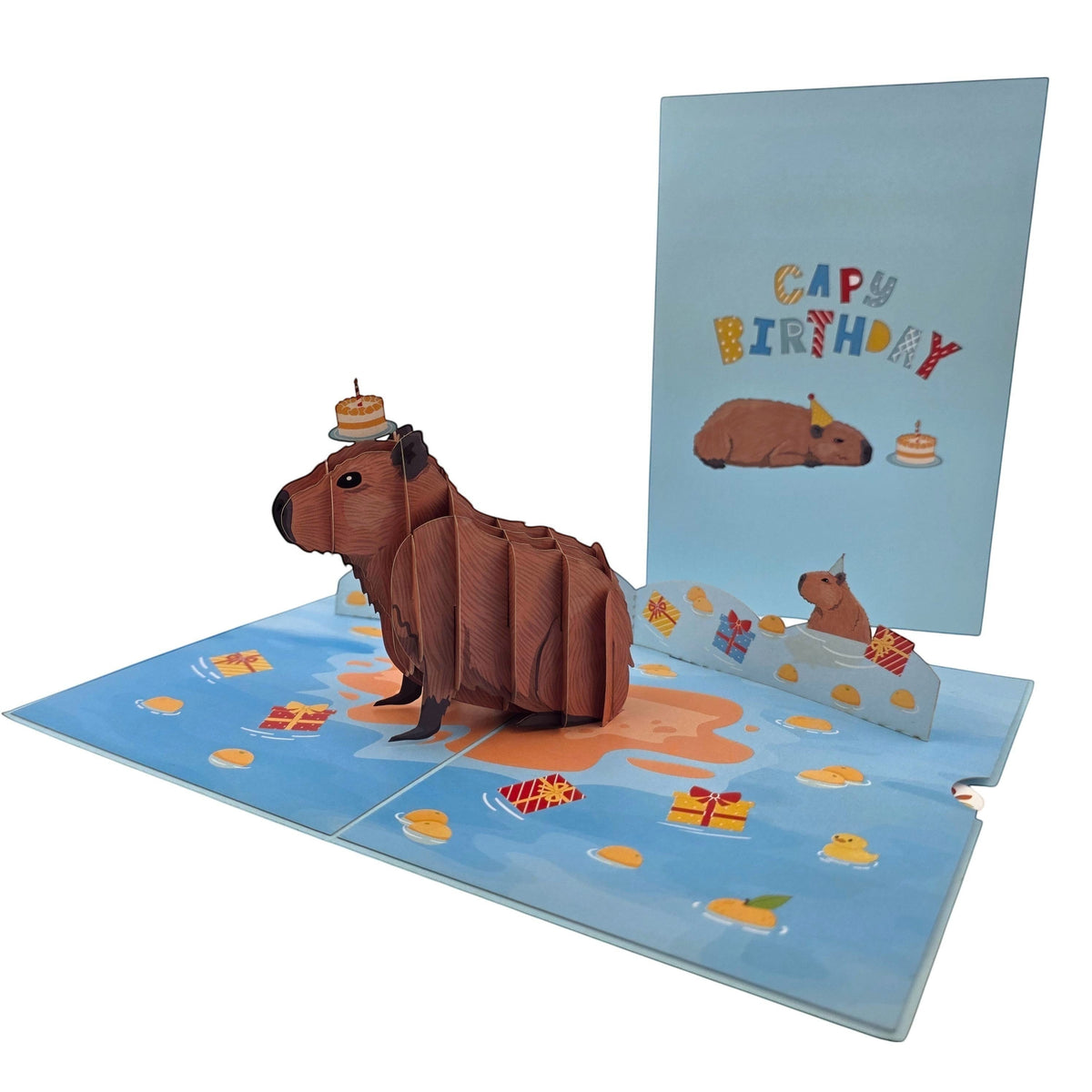 Color Pop Cards Capybara Birthday Pop Up Card with cake on head, surrounded by gifts and confetti.