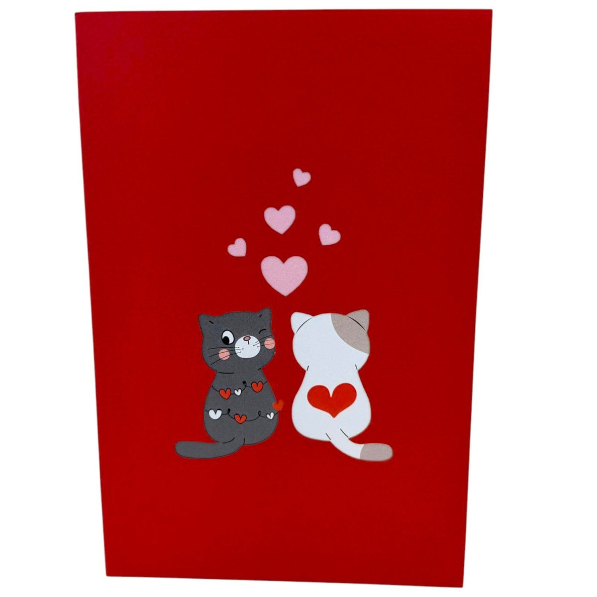 Color Pop Cards red pop-up card featuring two cartoon cats, one grey and one white, surrounded by pink hearts. Ideal for Valentine's Day.