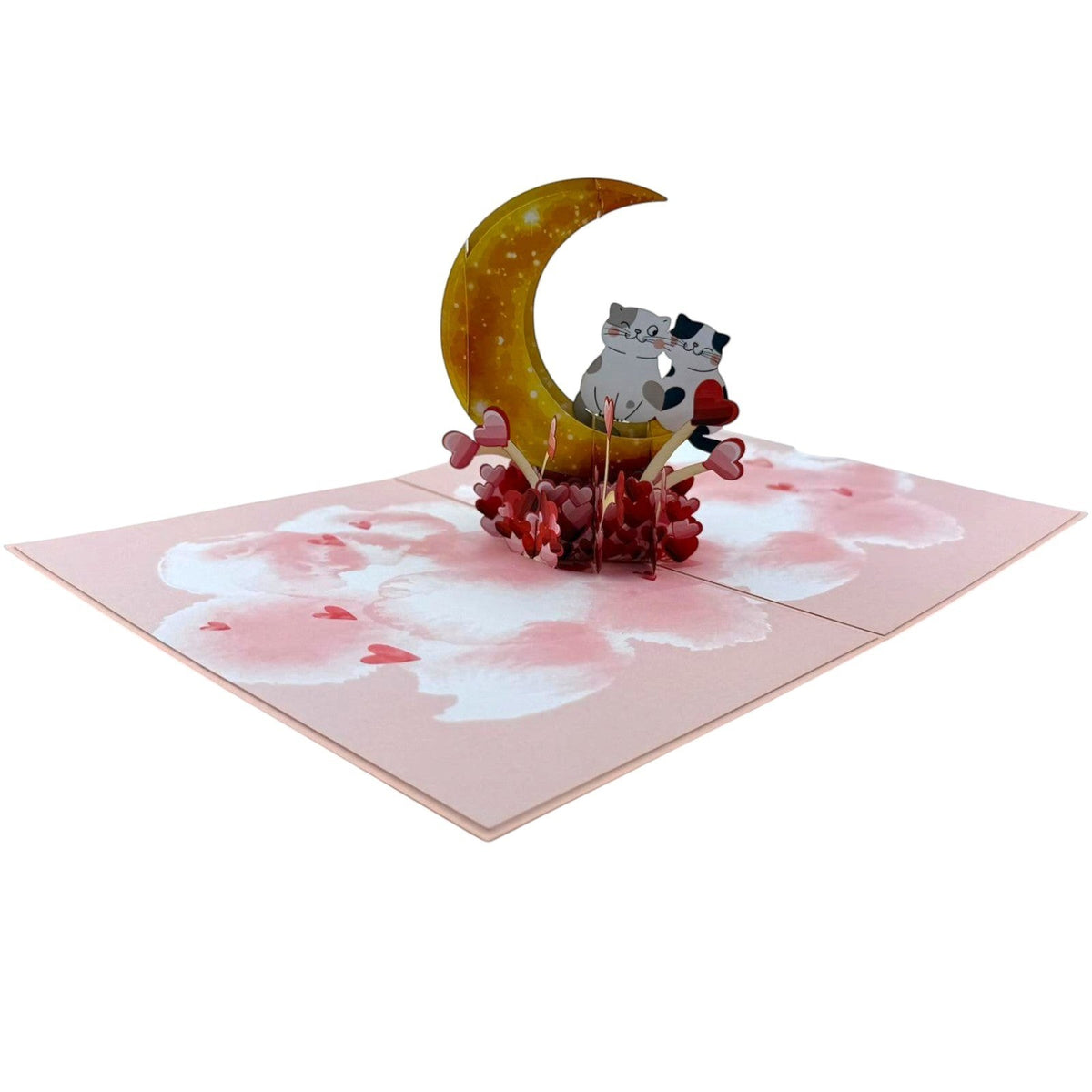 Color Pop Cards pop-up card featuring two cats sitting on a crescent moon, surrounded by hearts. Pink and white clouds on the card base.