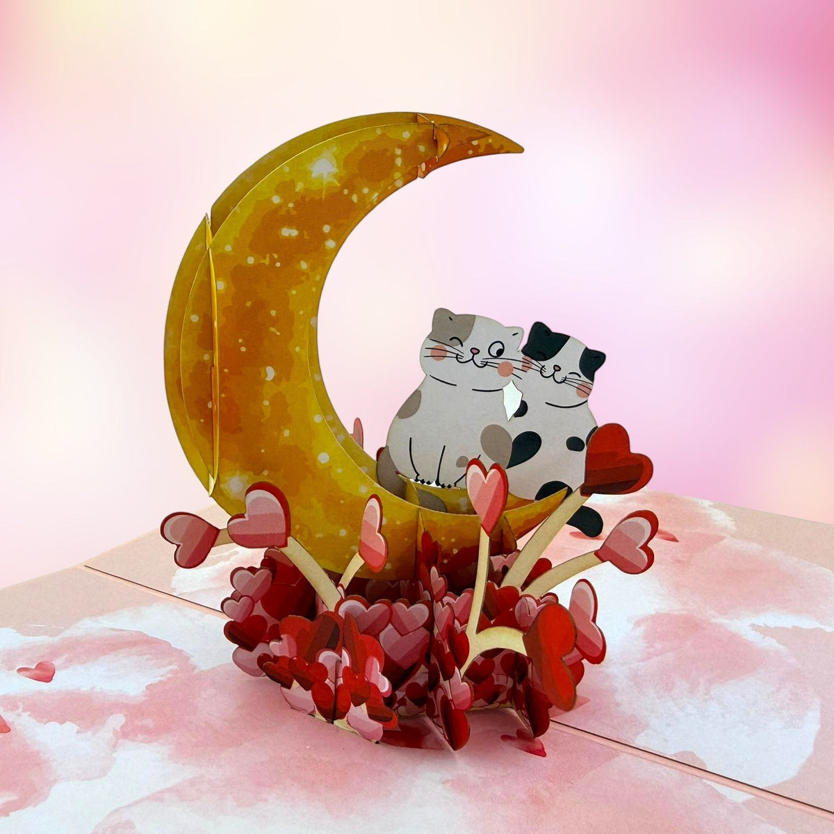 Color Pop Cards Meow Forever pop-up card featuring two cats sitting on a crescent moon surrounded by hearts.