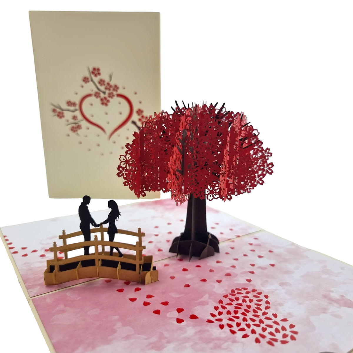 Color Pop Cards Cherry Blossom Love Pop-Up Card with couple on bridge under red tree, red petals.