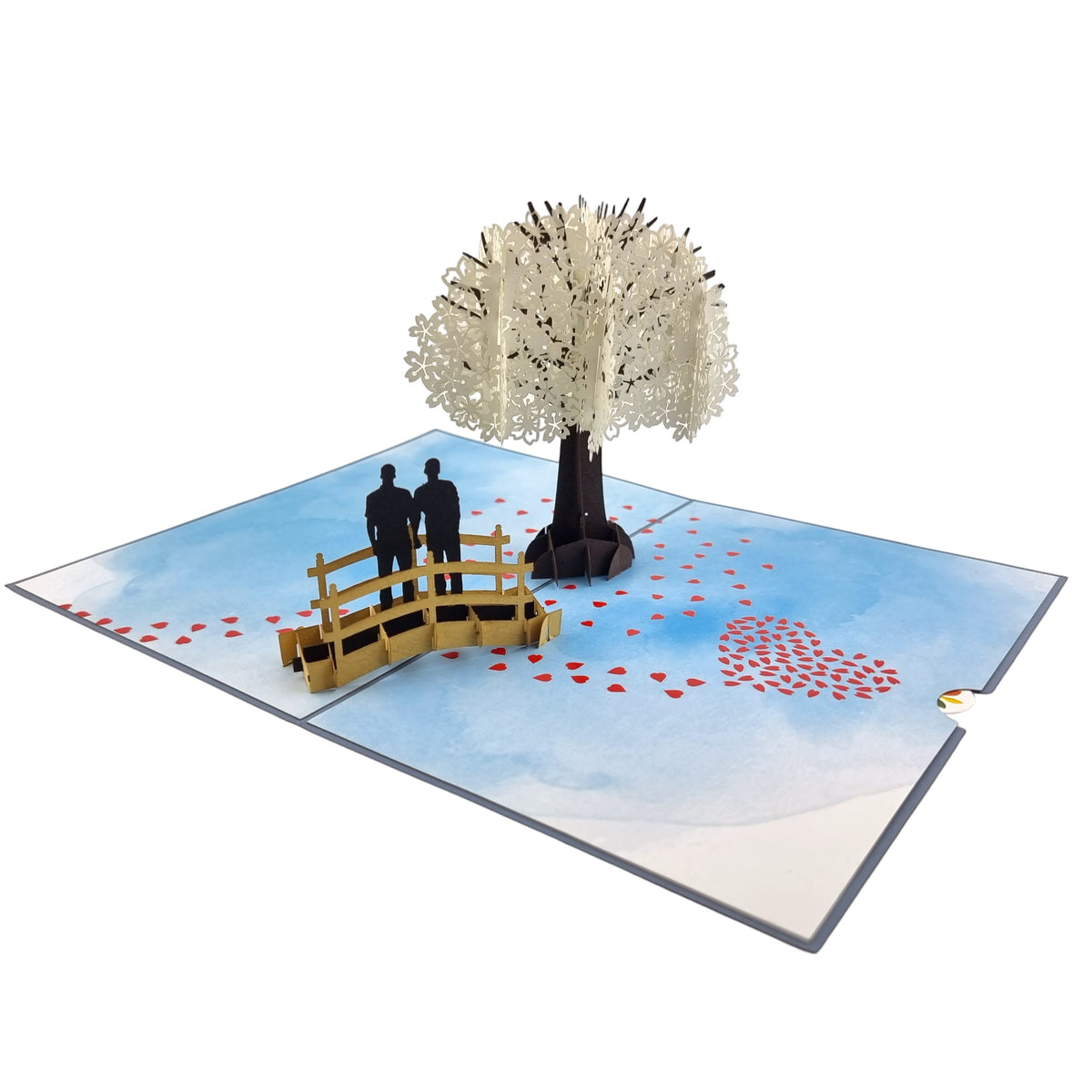 Color Pop Cards Cherry Blossom Love Scene pop-up card with a same-sex male couple on a bridge under a white tree.