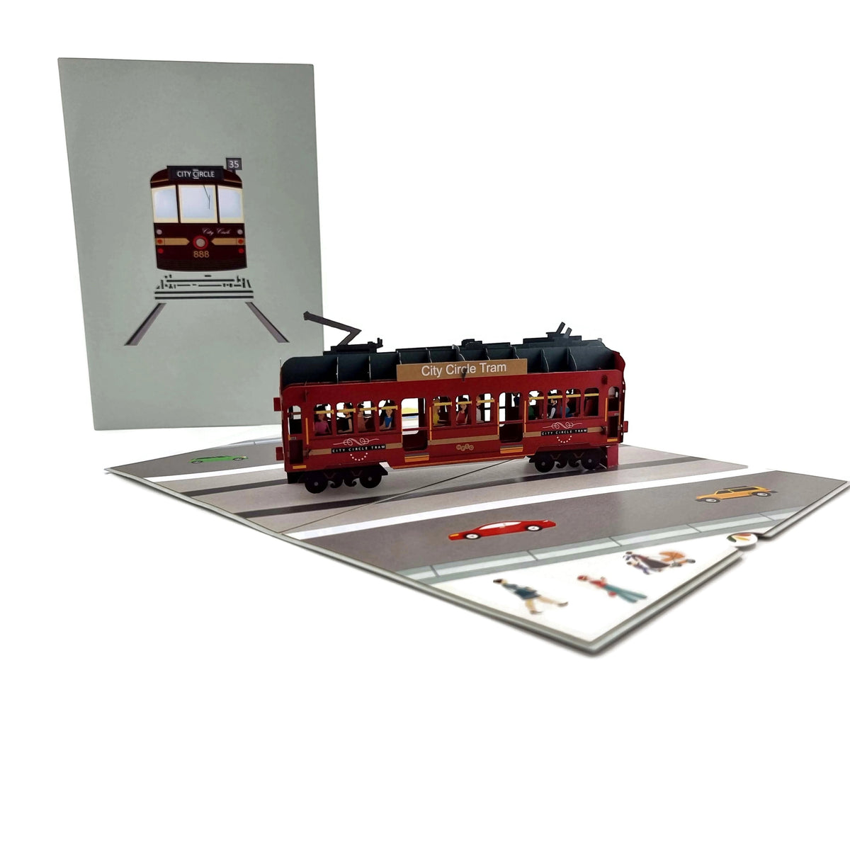 Color Pop Cards City Circle Tram pop-up card with 3D red tram and passengers on a street scene.