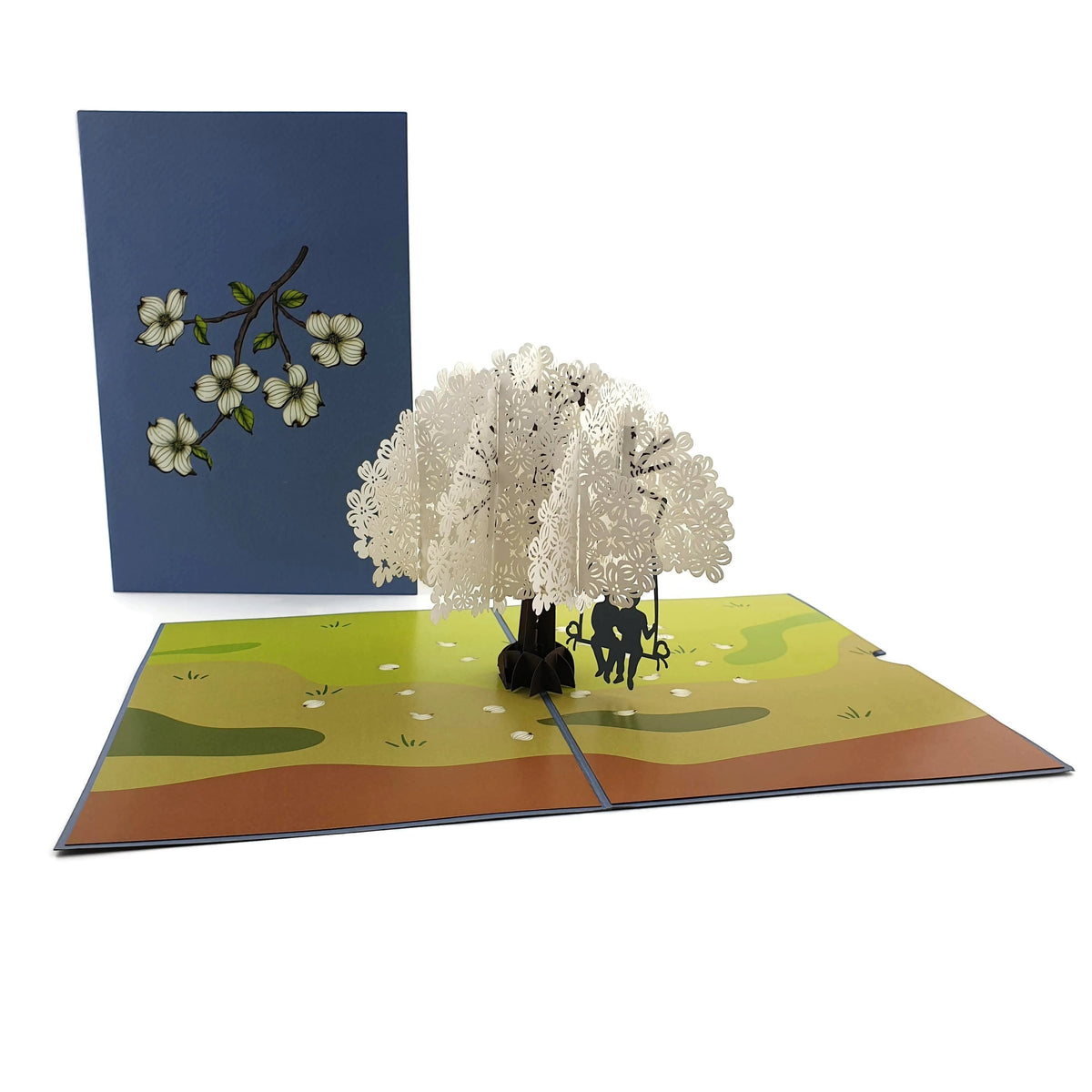 Color Pop Cards pop-up card featuring a white tree with a couple on a swing, and a blue cover with floral art.
