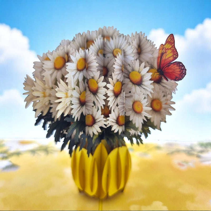 Color Pop Cards Daisy Bouquet Pop-Up Card with orange butterfly and yellow vase. White daisies.