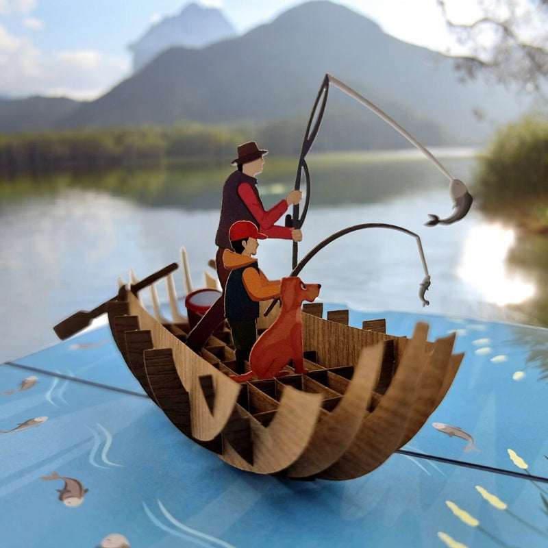 Color Pop Cards Fishing With Dad pop up card featuring a 3D boat with father, son, dog, and fish. Perfect for Father's Day.