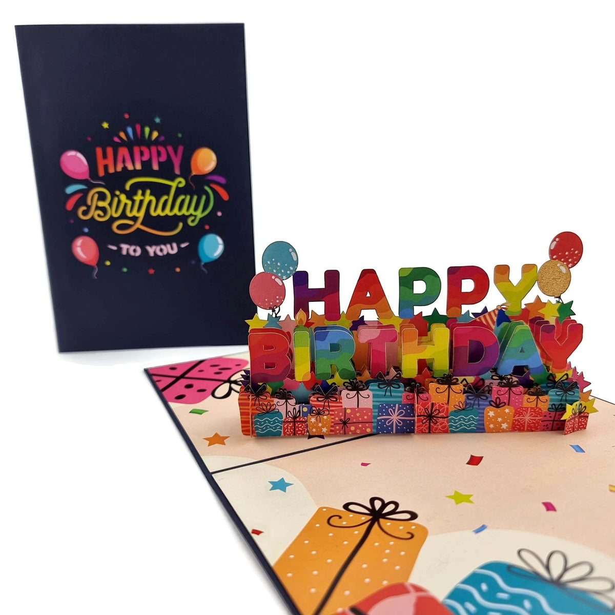 Color Pop Cards Happy Birthday pop-up card with rainbow lettering, gifts, and balloons. Includes envelope.