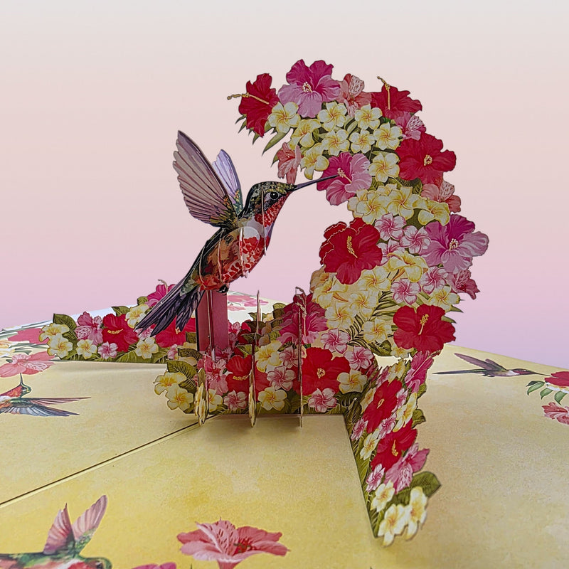 Color Pop Cards hummingbird and floral pop-up greeting card with intricate papercraft.