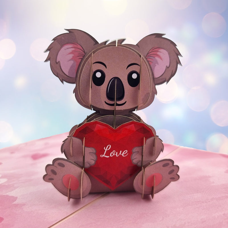 Color Pop Cards pop-up koala holding a red heart with the word "Love" on it. Cardboard construction.