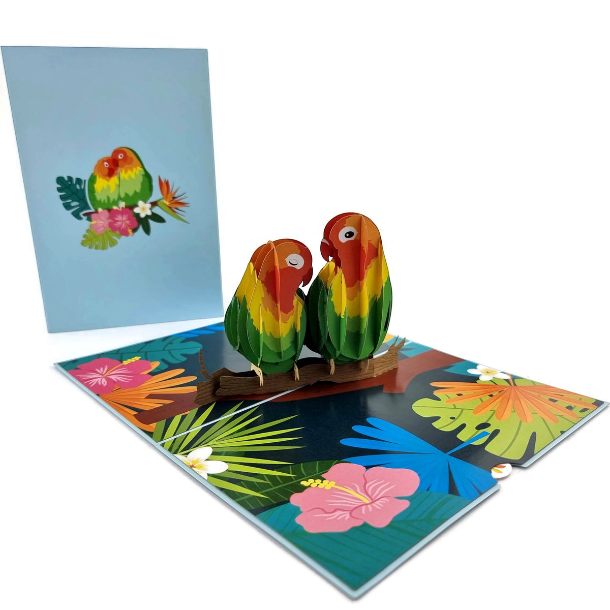 Color Pop Cards Love Birds Pop-Up Card with two colorful parrots on a branch surrounded by tropical flowers.
