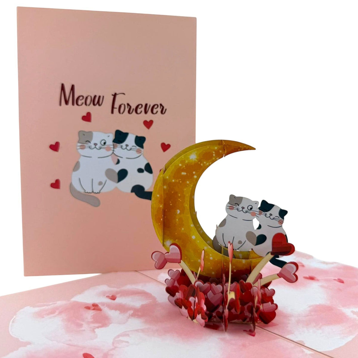 Color Pop Cards Meow Forever pop-up card with two cats sitting on a crescent moon, surrounded by hearts.