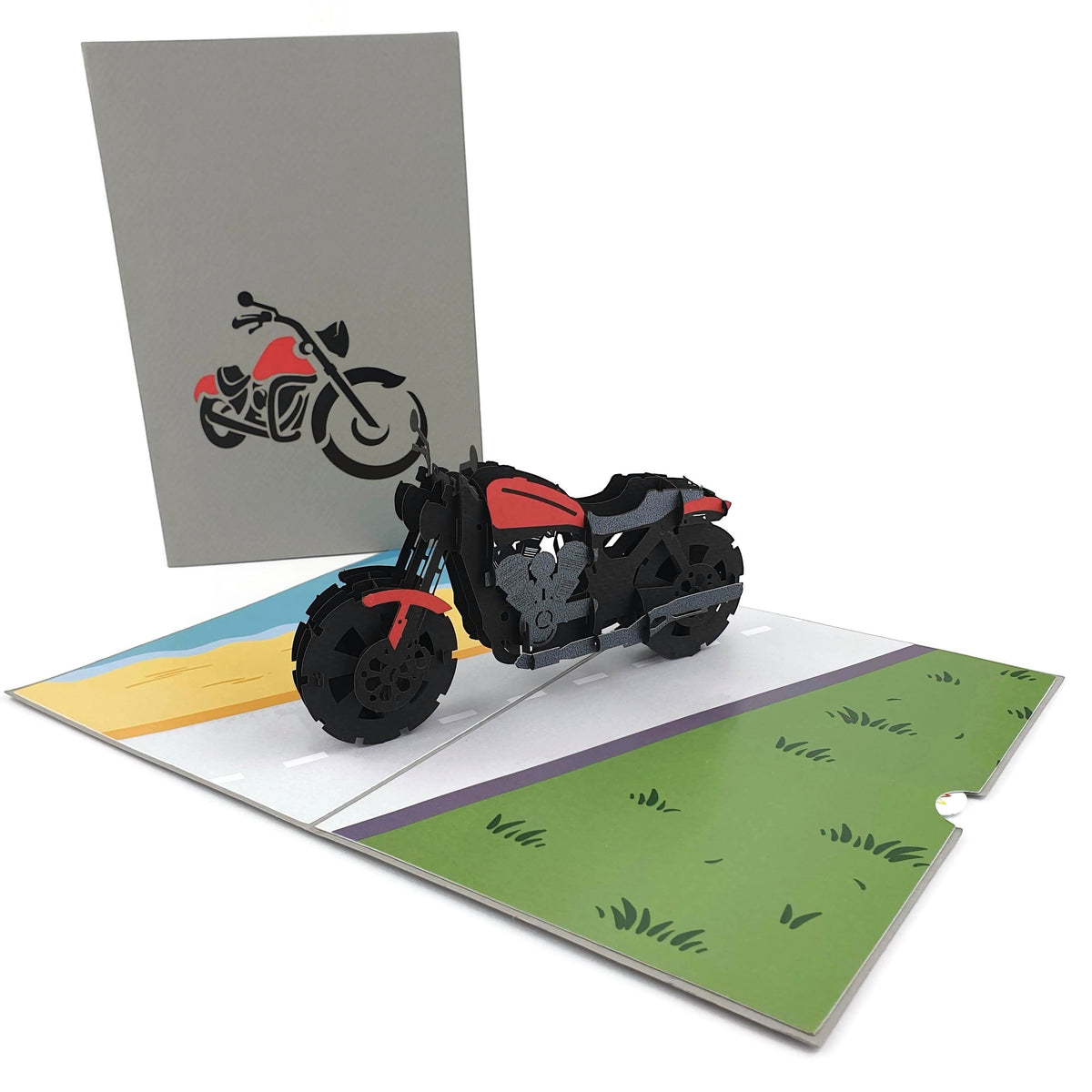 Color Pop Cards 3D motorcycle pop up card, red and black design, on a road scene.