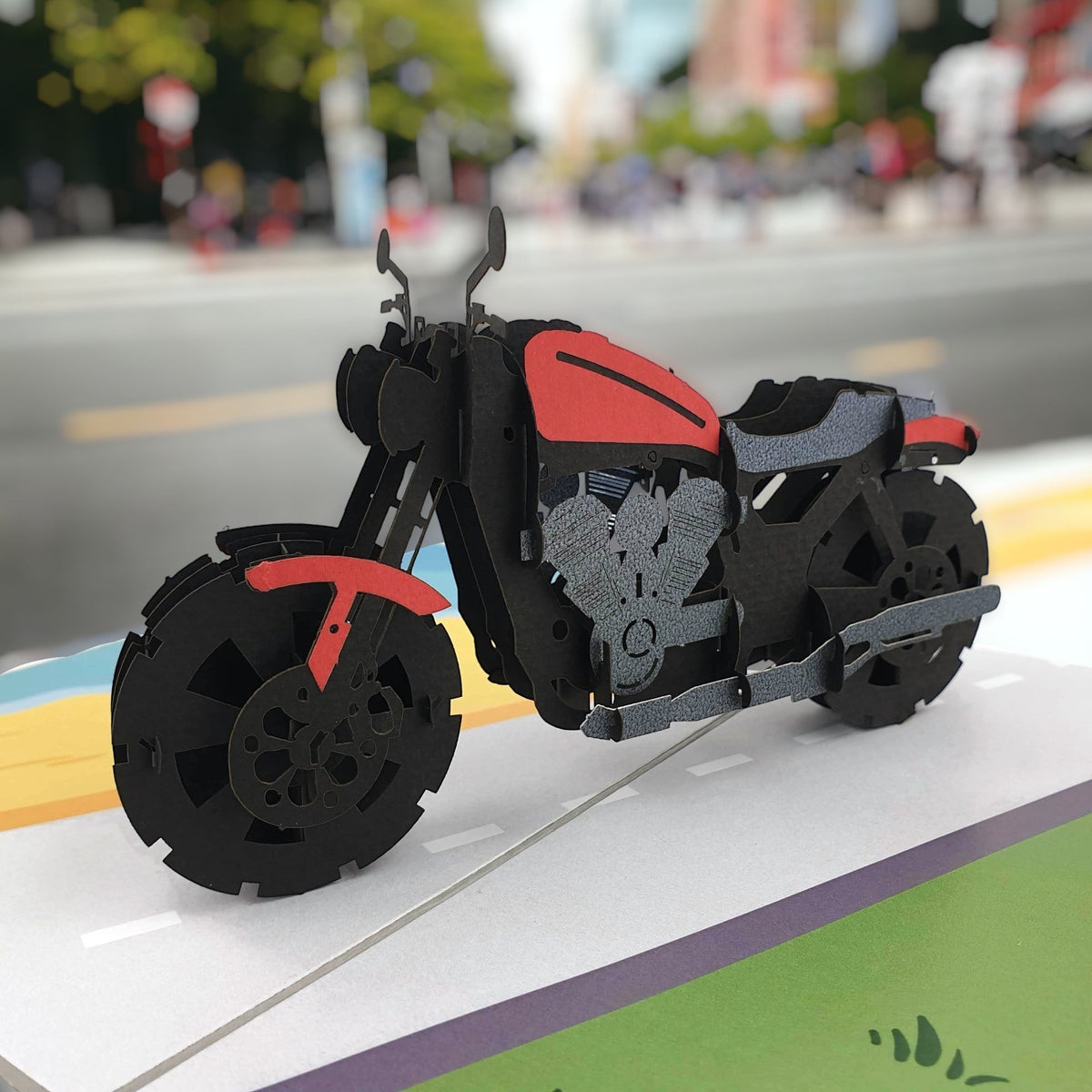 Color Pop Cards 3D pop up motorcycle card, red and black papercraft with detailed engine and wheels.
