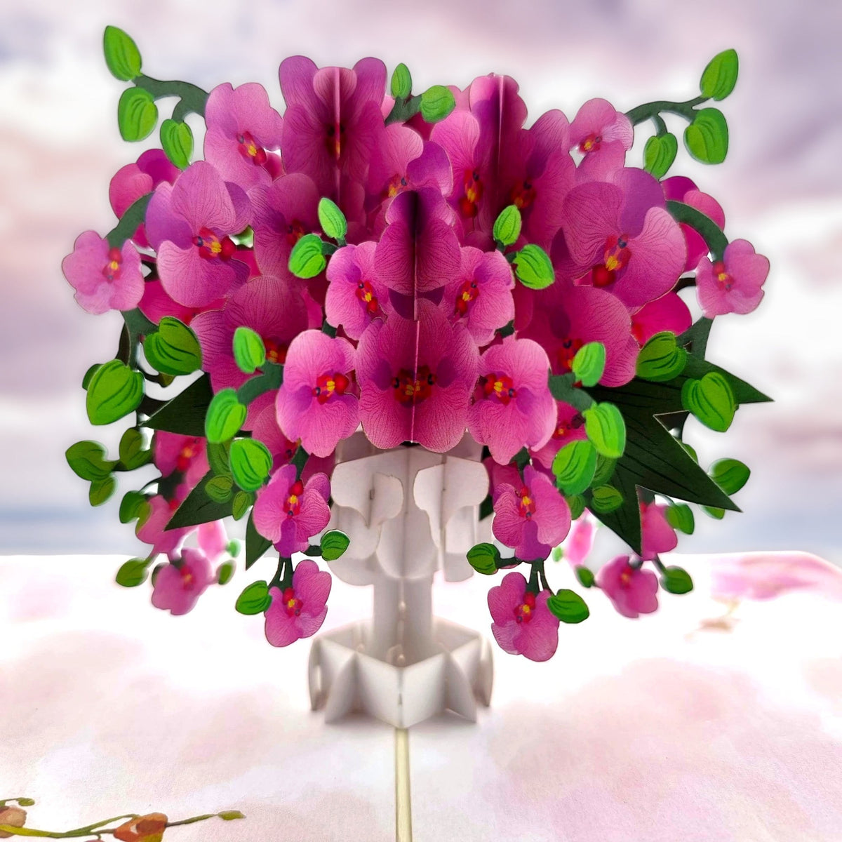 Color Pop Cards pink orchid bouquet pop up card in a white vase with green leaves.