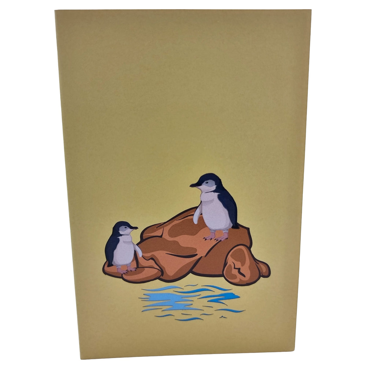 Color Pop Cards Little Penguin pop up card featuring two penguins on a rock with blue water.