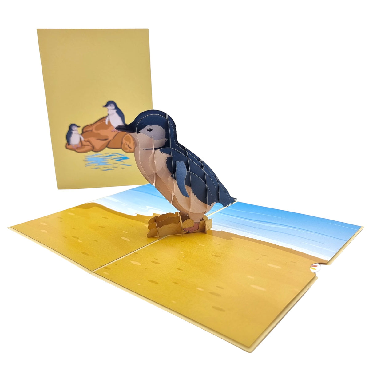 Color Pop Cards Little Penguin pop-up card featuring a 3D penguin on a beach scene. Includes envelope.