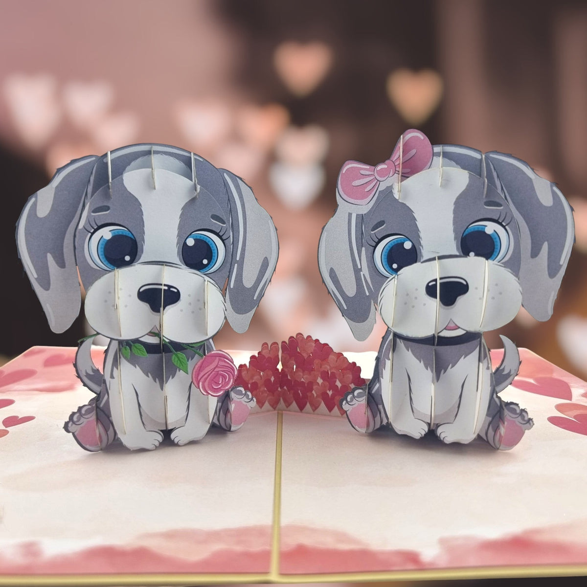 Color Pop Cards Puppy Love Pop Up Card featuring two grey and white cartoon puppies, one holding a pink rose, the other with a pink bow.
