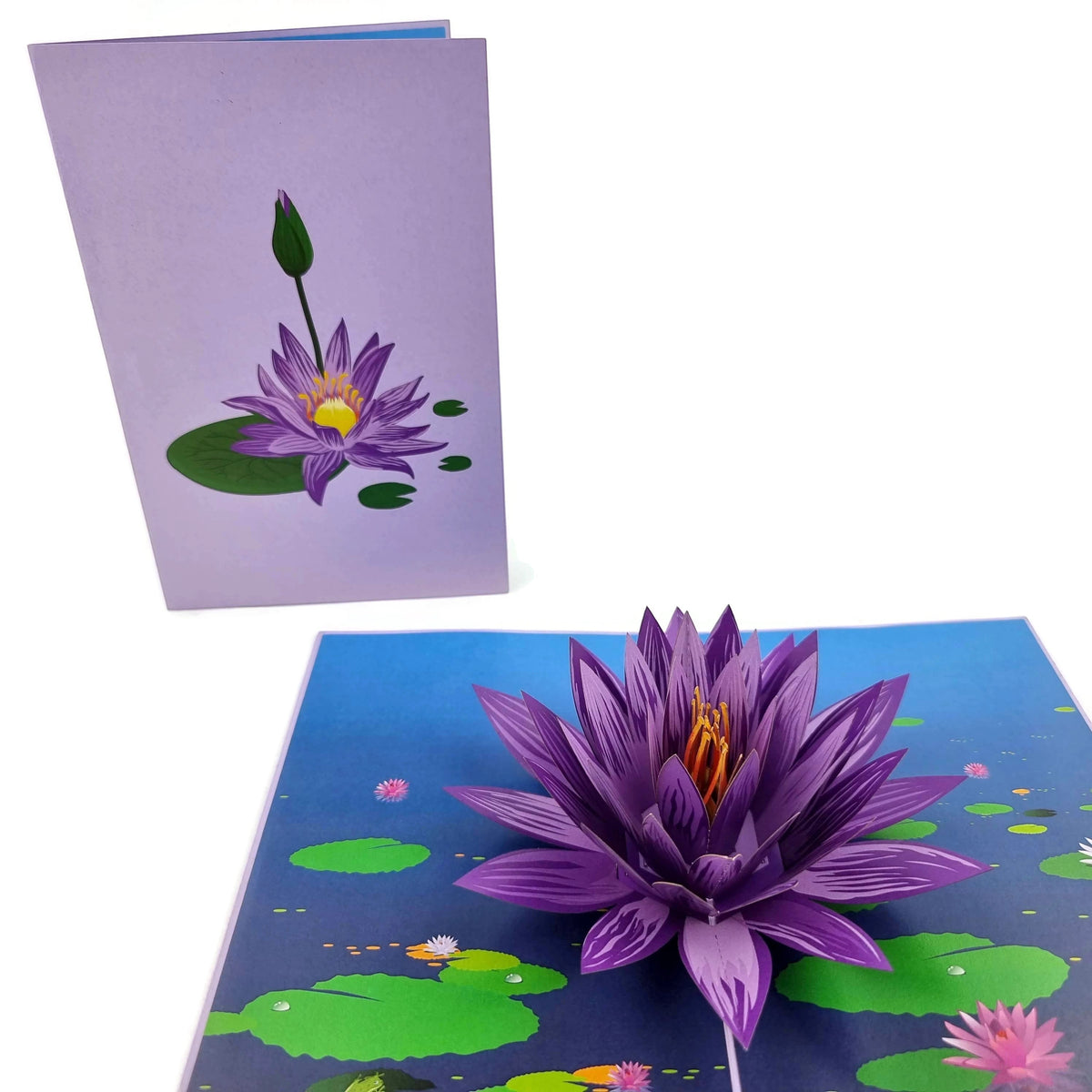 Color Pop Cards purple water lily flower pop up card with green leaves in a pond setting.