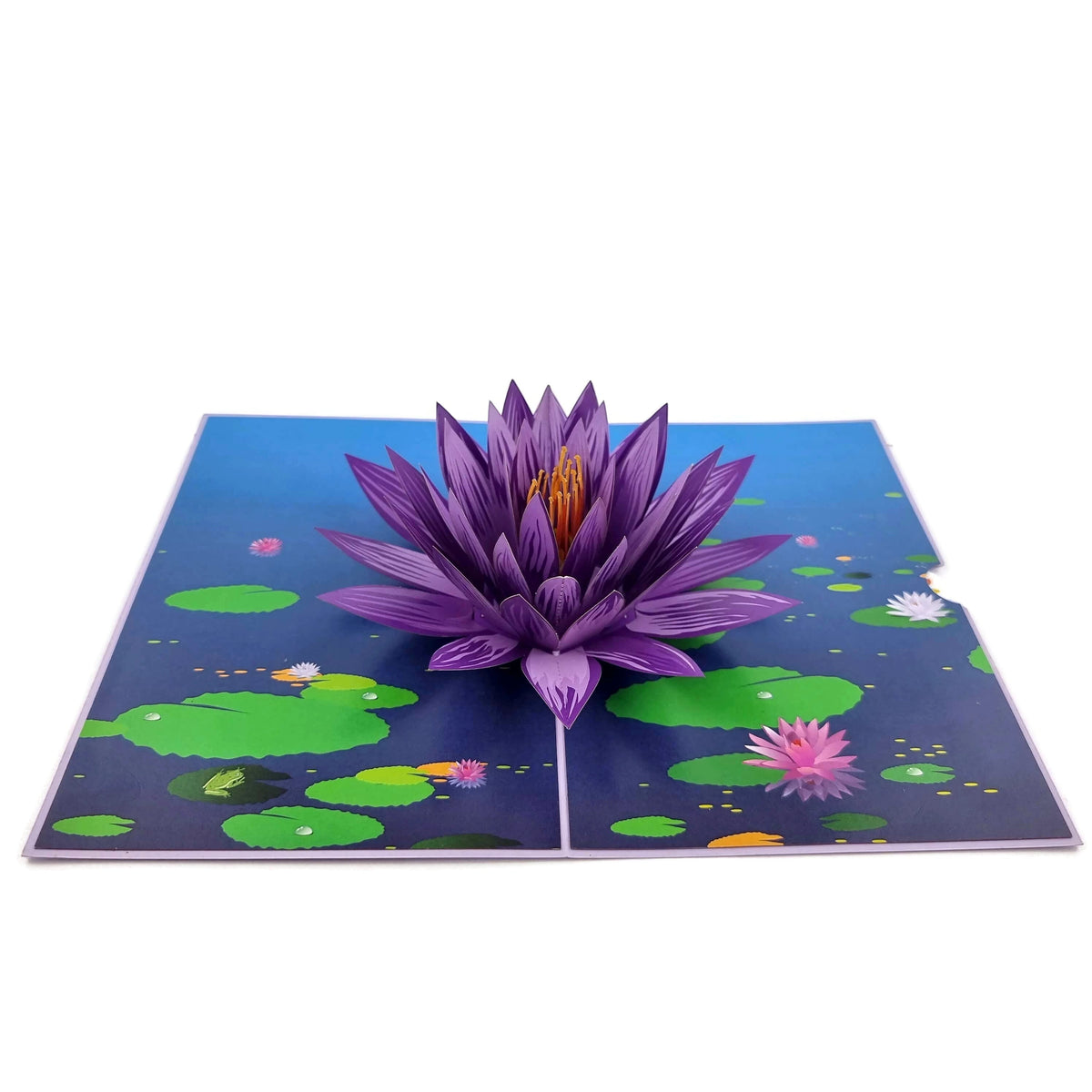 Color Pop Cards purple water lily pop up card with green lily pads and a blue pond background.