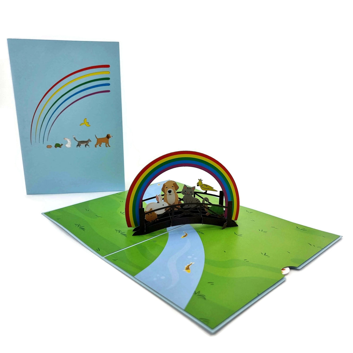 Color Pop Cards Rainbow Bridge pet memorial pop-up card with animals on a bridge over a river.
