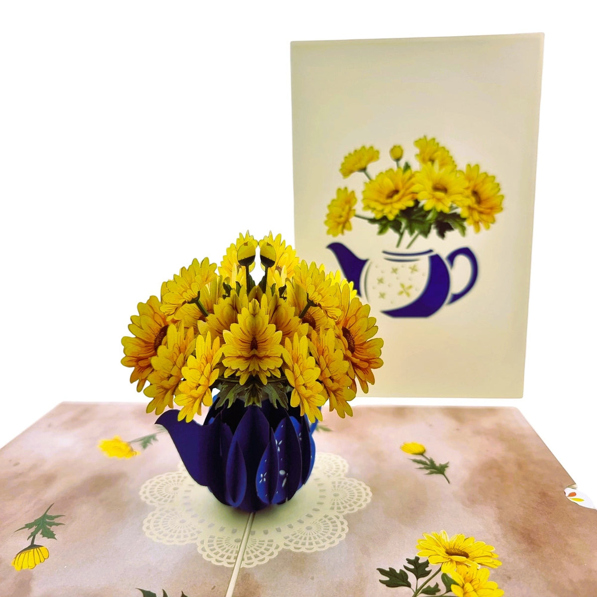 Color Pop Cards pop-up card featuring a blue teapot with yellow daisies and a doily.