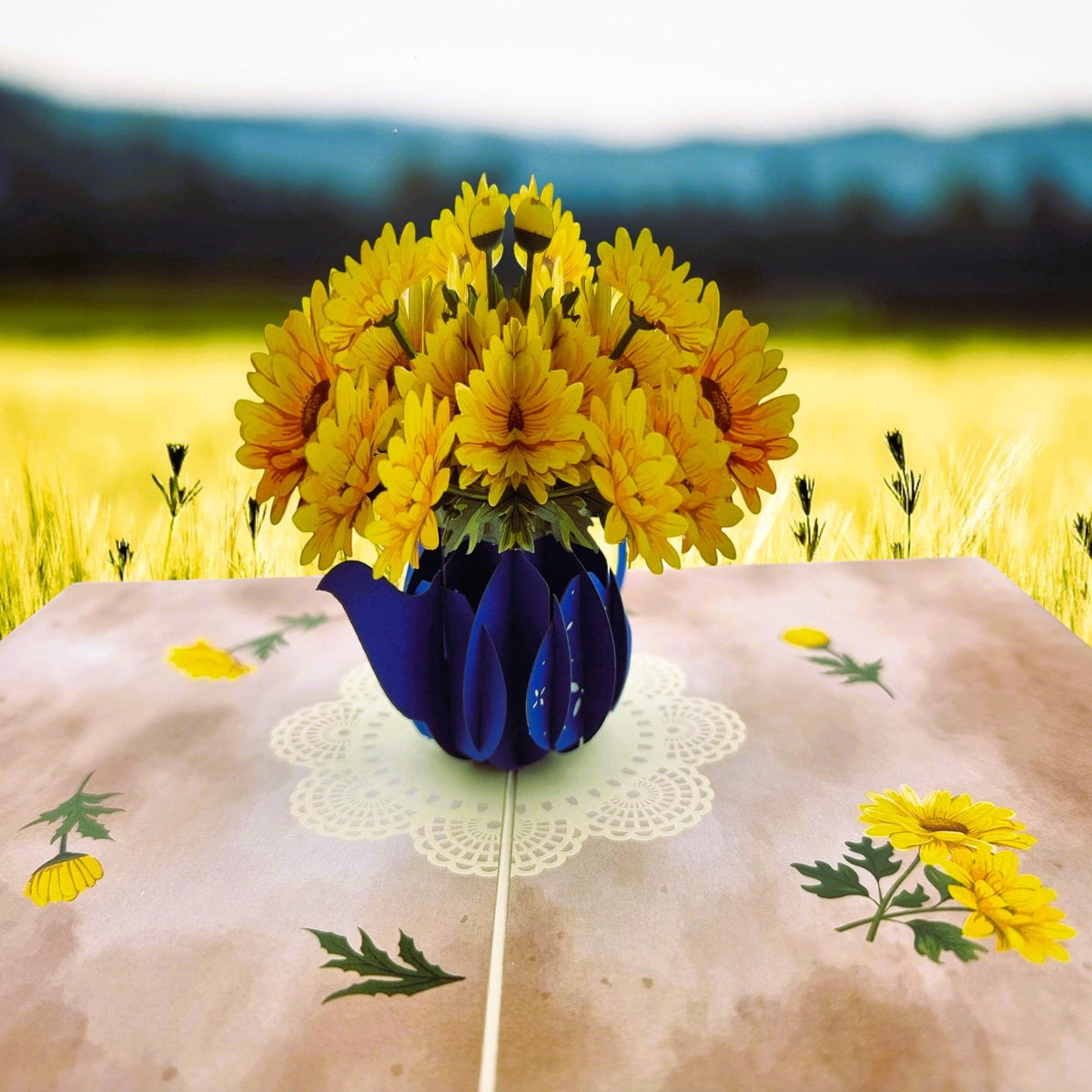 Color Pop Cards blue teapot pop up card with yellow daisies and floral details. Blank inside.