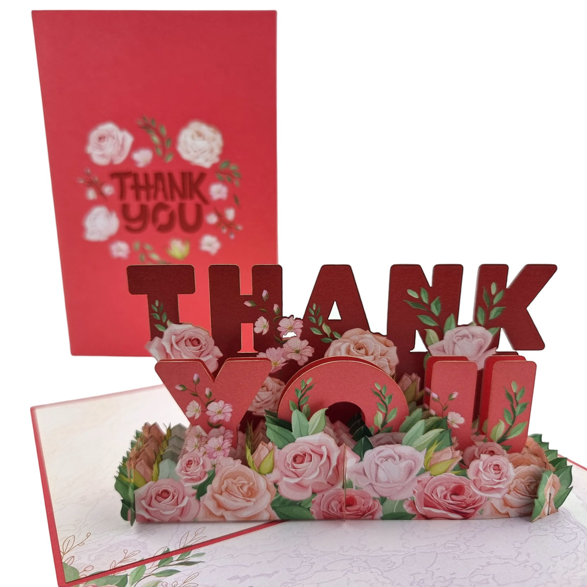 Color Pop Cards Thank You Flowers Pop-Up Card with red cover and floral design. Opens to reveal 3D "THANK YOU" text surrounded by pink and cream roses.