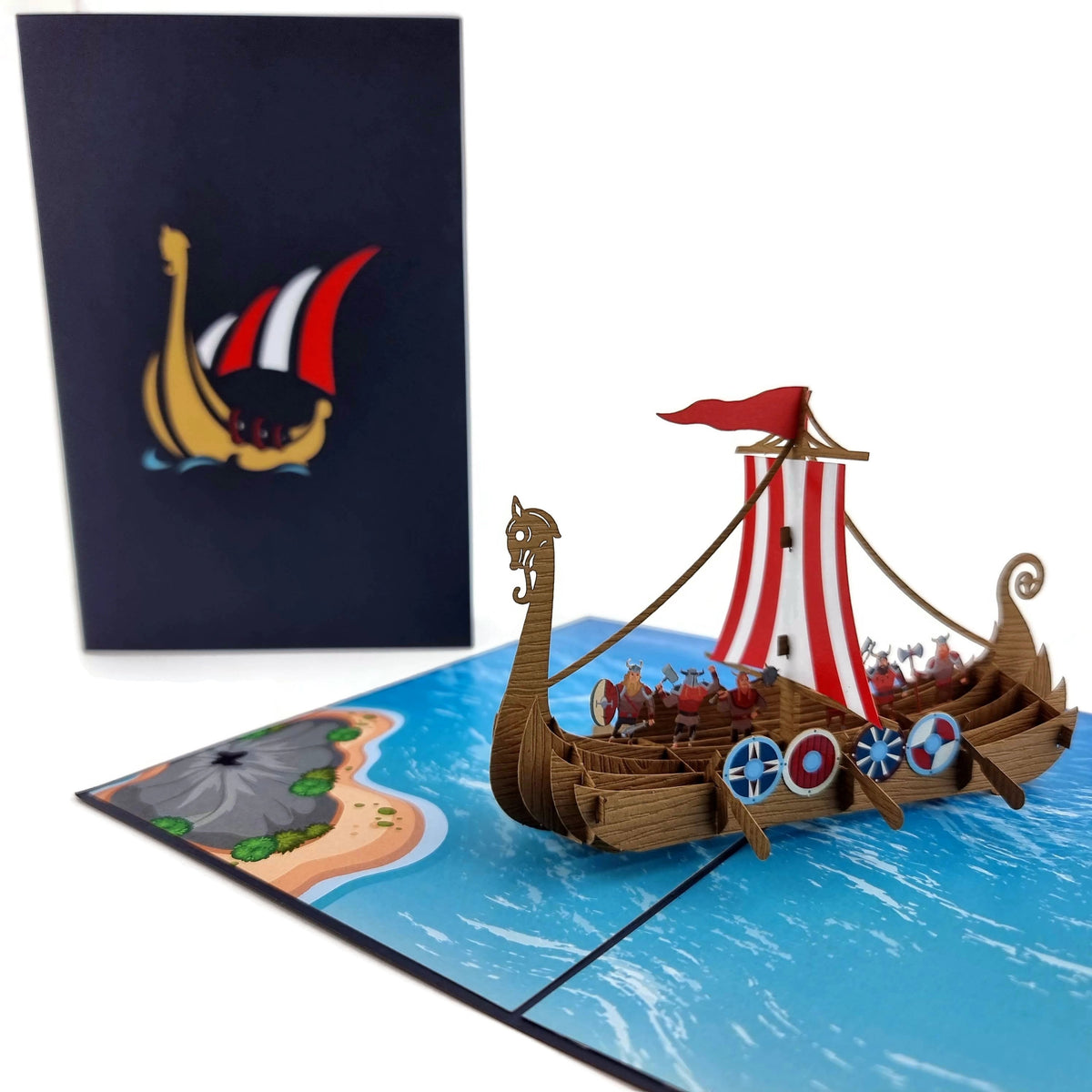 Color Pop Cards Viking ship pop-up card with red and white striped sail, shields, and dragon bow detail.