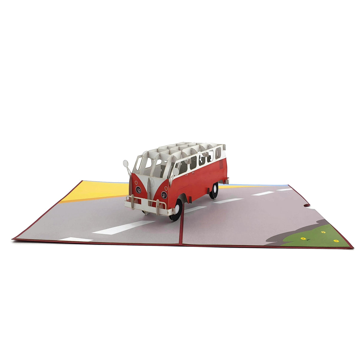 Color Pop Cards vintage red and white camper van pop up card on a road scene.