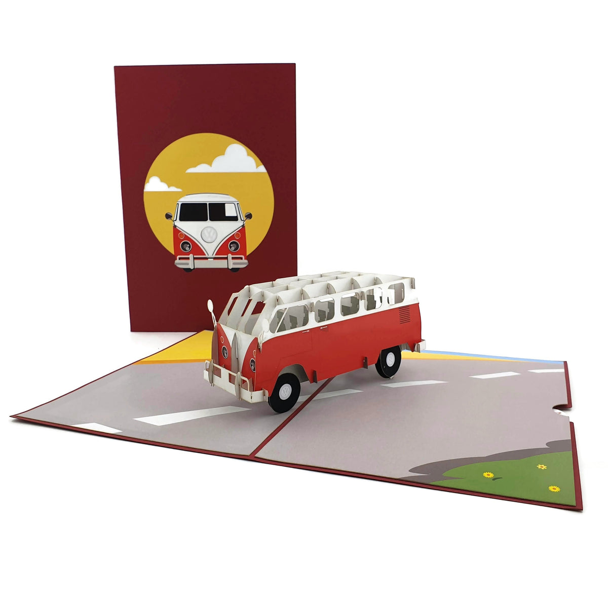 Color Pop Cards red and white vintage camper van pop up card with 3D model on a road scene.