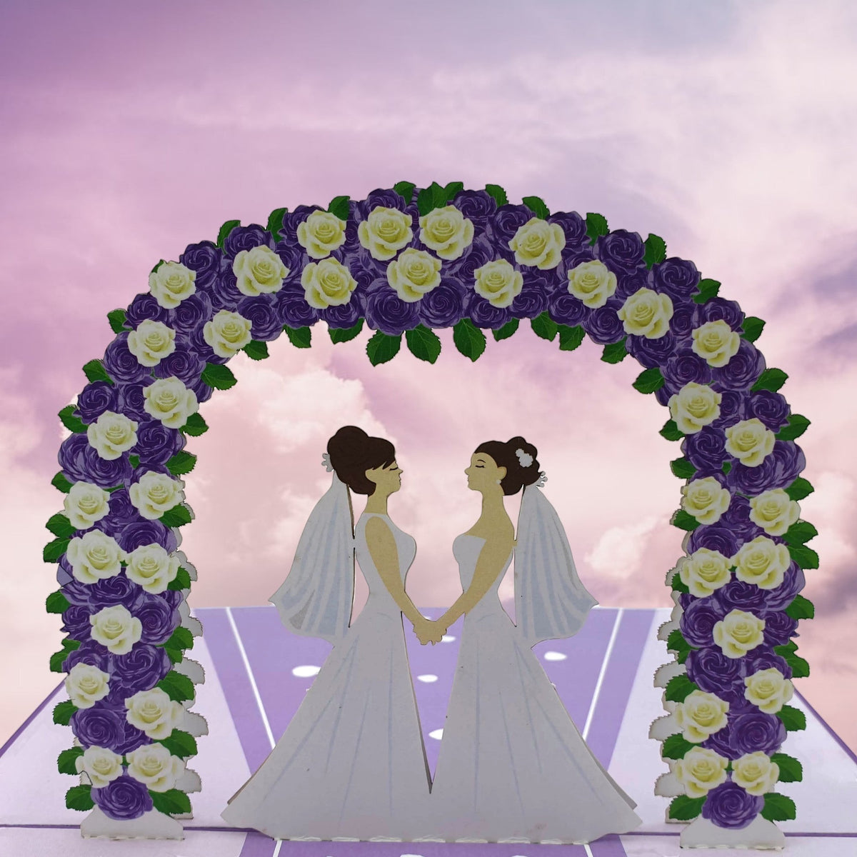 Color Pop Cards wedding pop-up card featuring two brides in white dresses under a purple and white rose arch.