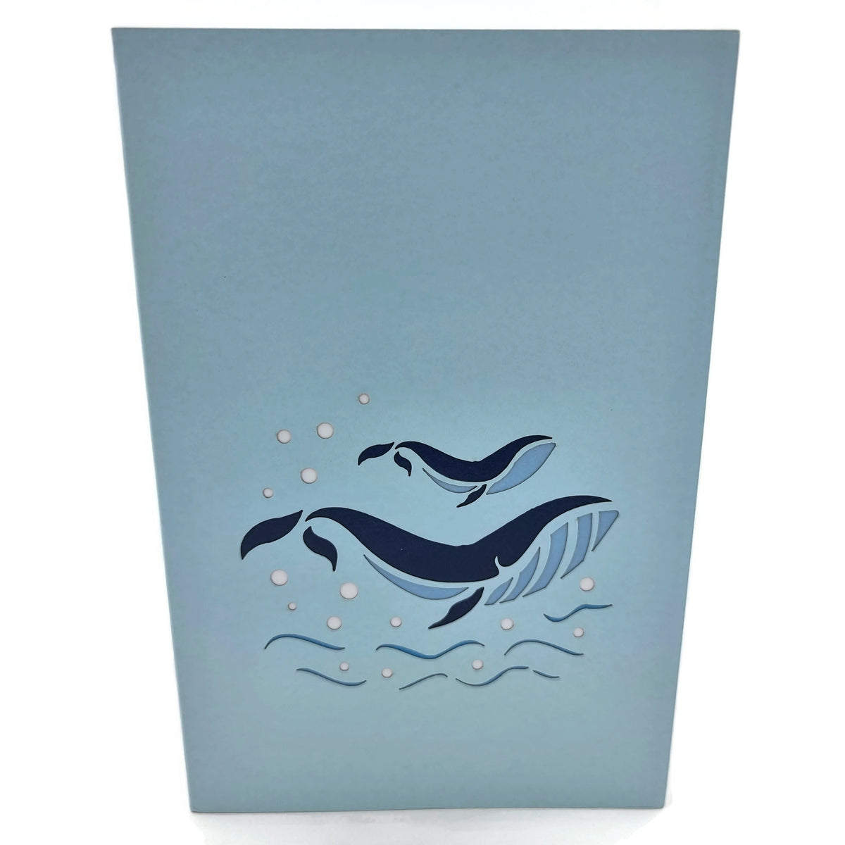 Color Pop Cards blue whale family pop up greeting card with baby whale and bubbles.