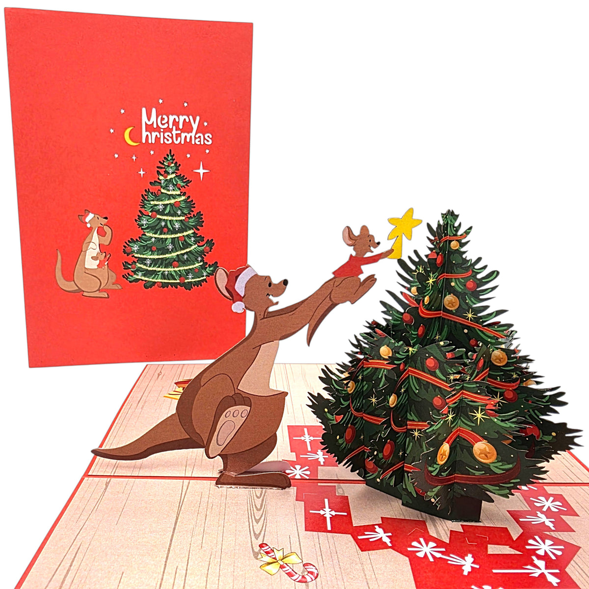 A 3D pop-up Christmas card featuring a kangaroo and a mouse decorating a Christmas tree, with a red back cover reading 'Merry Christmas' and a tree illustration.