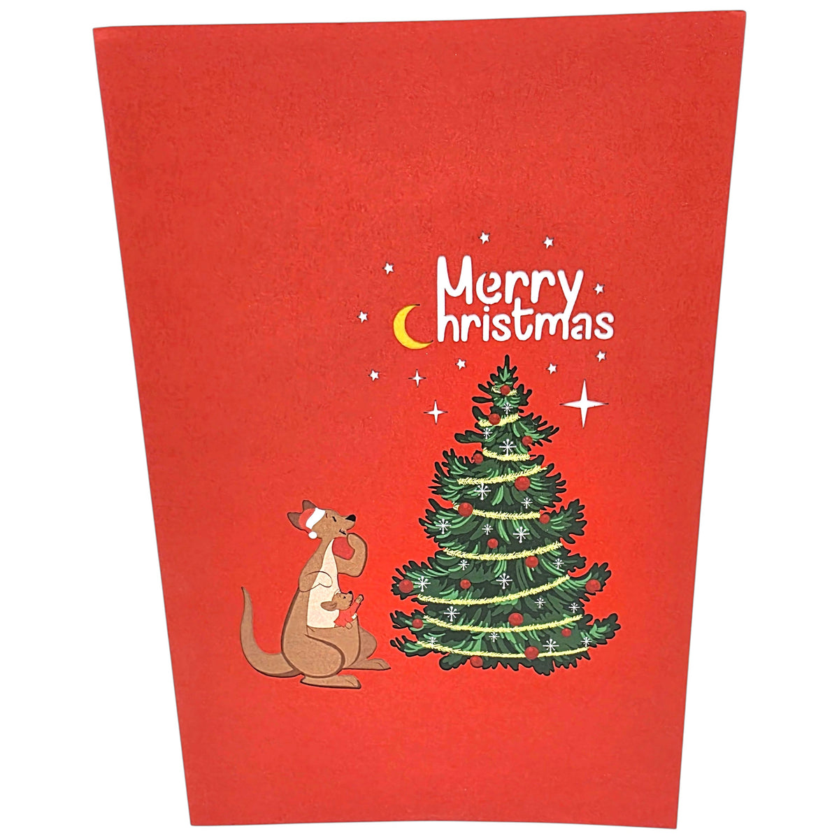 A red Christmas greeting card featuring a cartoon kangaroo wearing a Santa hat next to a decorated Christmas tree, with 'Merry christmas' written in white text with a small yellow crescent moon.